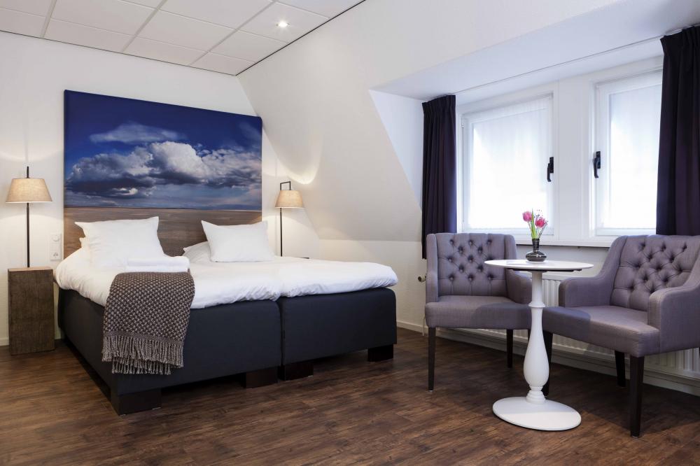 Overnachten hotelaanbieding arrangement Texel hotelkamer