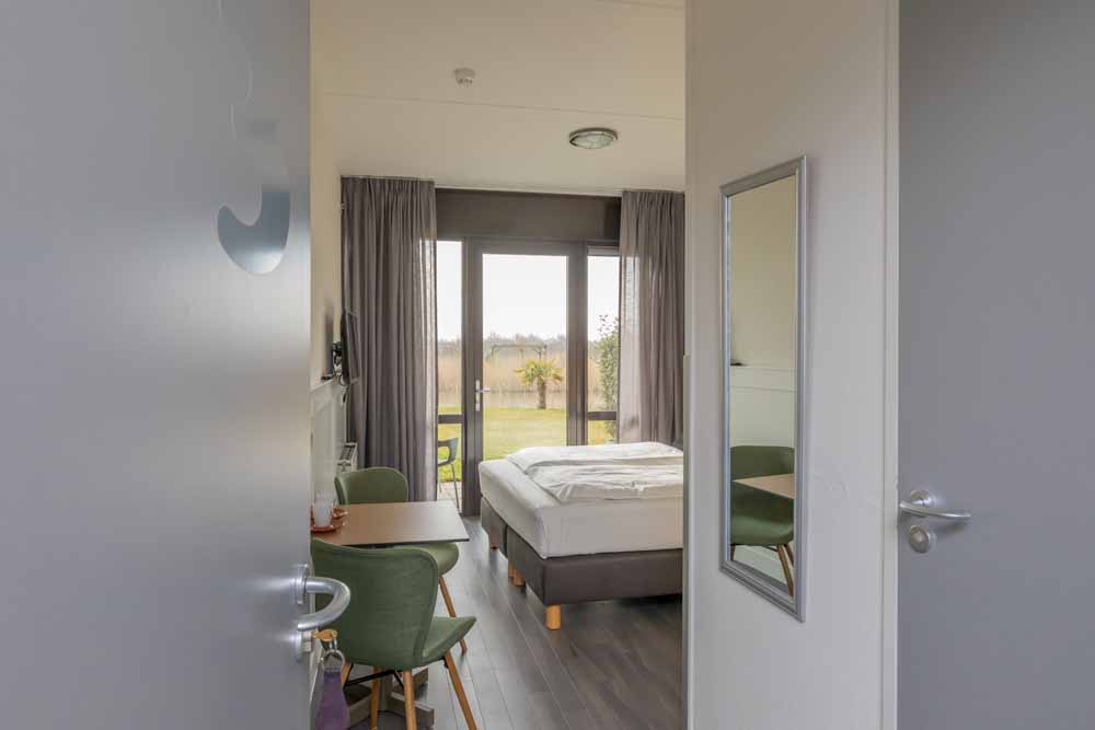 hotelarrangement hotel resort land en zee de luxe kamers ingang