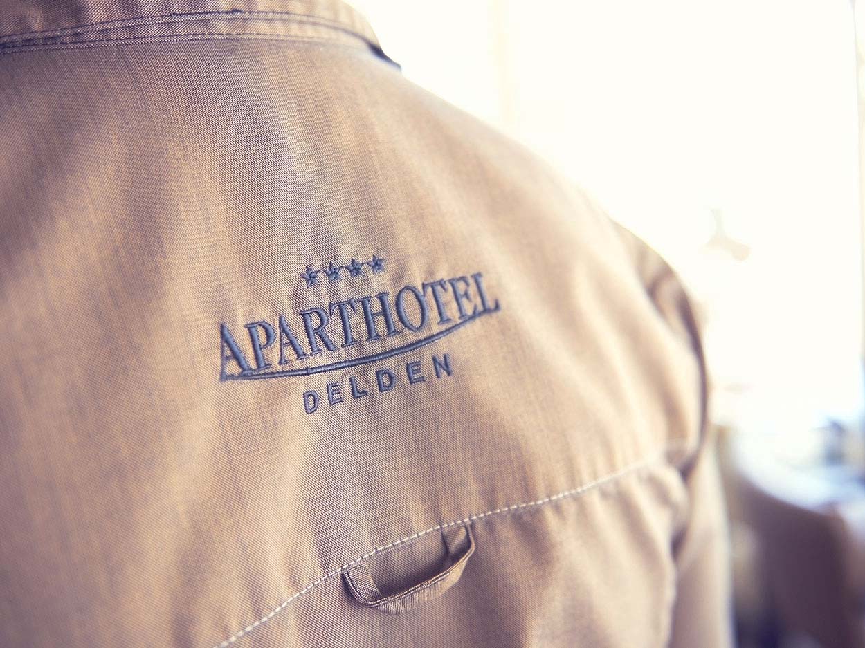 Apart Hotel Delden Werk Kleding Logo