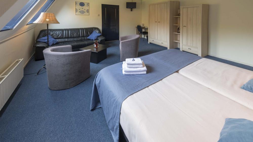 Hotelkamer met balkon